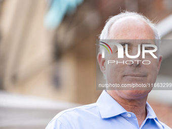 Sen. Bob Casey (D-PA) stands outside a campaign rally in Philadelphia, Pennsylvania, United States, on October 13, 2024. (