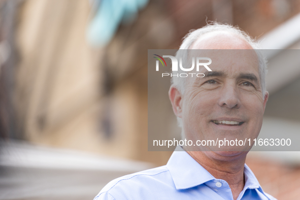 Sen. Bob Casey (D-PA) stands outside a campaign rally in Philadelphia, Pennsylvania, United States, on October 13, 2024. 