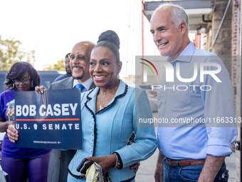 From left to right, State Sen. Vincent Hughes (D-Phila), actress and singer Sheryl Lee Ralph, and U.S. Sen. Bob Casey (D-PA) pose for a grou...