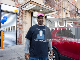 Harris-Walz campaign volunteer Martin Jones poses for a photo outside a campaign event in Philadelphia, Pennsylvania, United States, on Octo...