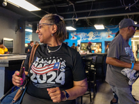 A woman dances at a campaign event in Philadelphia, Pennsylvania, United States, on October 13, 2024. (