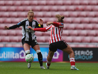 Beth Lumsden of Newcastle battles with Jessica Brown of Sunderland during the FA Women's Championship match between Sunderland and Newcastle...