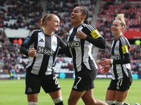 Beth Lumsden of Newcastle celebrates with Shania Hayles and Jasmine McQuade after scoring their first goal during the FA Women's Championshi...