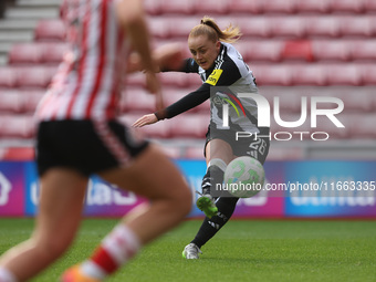 Beth Lumsden of Newcastle shoots and scores their first goal during the FA Women's Championship match between Sunderland and Newcastle Unite...