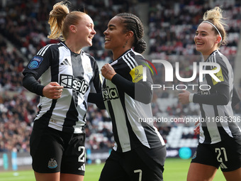 Beth Lumsden of Newcastle celebrates with Shania Hayles and Jasmine McQuade after scoring their first goal during the FA Women's Championshi...