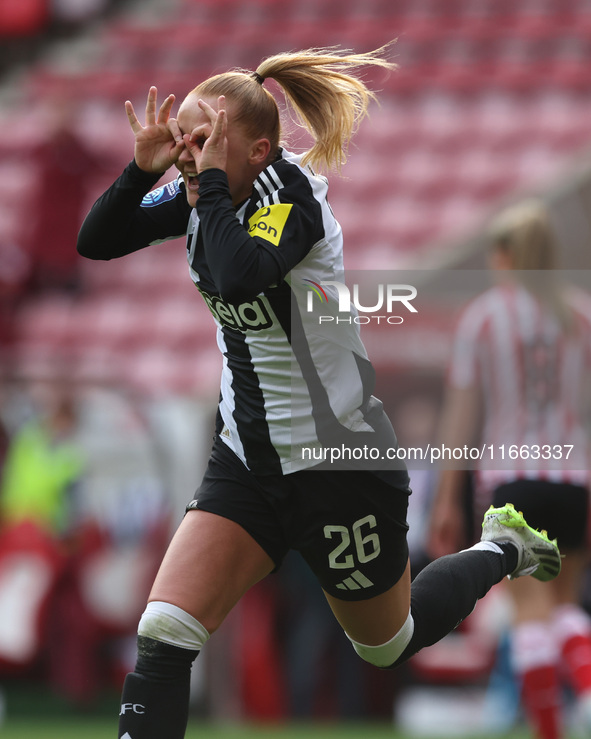 Beth Lumsden celebrates after scoring Newcastle's first goal during the FA Women's Championship match between Sunderland and Newcastle Unite...