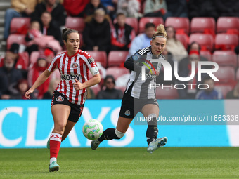 Jasmine McQuade of Newcastle competes with Natasha Fenton of Sunderland during the FA Women's Championship match between Sunderland and Newc...