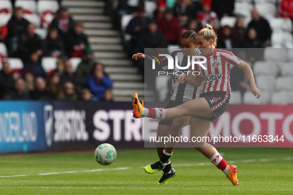 Newcastle's Shania Hayles battles with Sunderland's Jessie Stapleton during the FA Women's Championship match between Sunderland and Newcast...