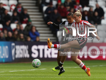 Newcastle's Shania Hayles battles with Sunderland's Jessie Stapleton during the FA Women's Championship match between Sunderland and Newcast...