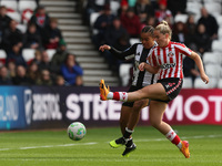 Newcastle's Shania Hayles battles with Sunderland's Jessie Stapleton during the FA Women's Championship match between Sunderland and Newcast...