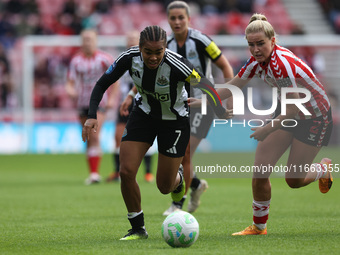 Newcastle's Shania Hayles is in action with Sunderland's Jessie Stapleton during the FA Women's Championship match between Sunderland and Ne...