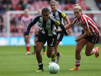 Newcastle's Shania Hayles is in action with Sunderland's Jessie Stapleton during the FA Women's Championship match between Sunderland and Ne...