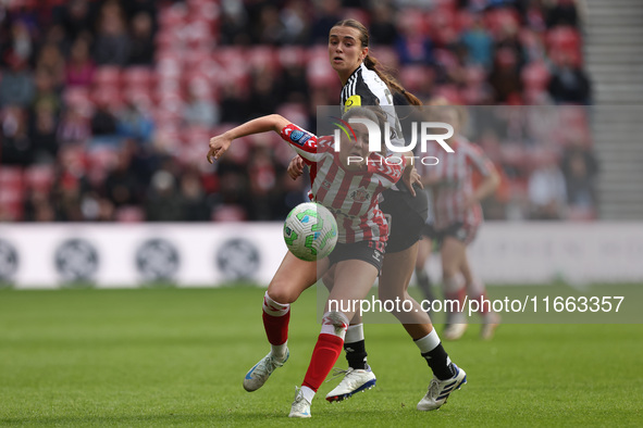 Sunderland's Grace Ede battles with Newcastle's Isabella Sibley during the FA Women's Championship match between Sunderland and Newcastle Un...