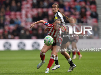 Sunderland's Grace Ede battles with Newcastle's Isabella Sibley during the FA Women's Championship match between Sunderland and Newcastle Un...