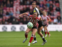 Sunderland's Grace Ede battles with Newcastle's Isabella Sibley during the FA Women's Championship match between Sunderland and Newcastle Un...