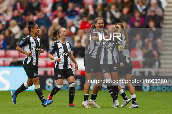 Beth Lumsden of Newcastle celebrates with her teammates after scoring their second goal during the FA Women's Championship match between Sun...