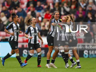 Beth Lumsden of Newcastle celebrates with her teammates after scoring their second goal during the FA Women's Championship match between Sun...