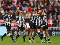 Beth Lumsden of Newcastle celebrates with her teammates after scoring their second goal during the FA Women's Championship match between Sun...