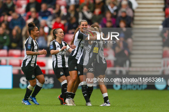 Beth Lumsden of Newcastle celebrates with her teammates after scoring their second goal during the FA Women's Championship match between Sun...