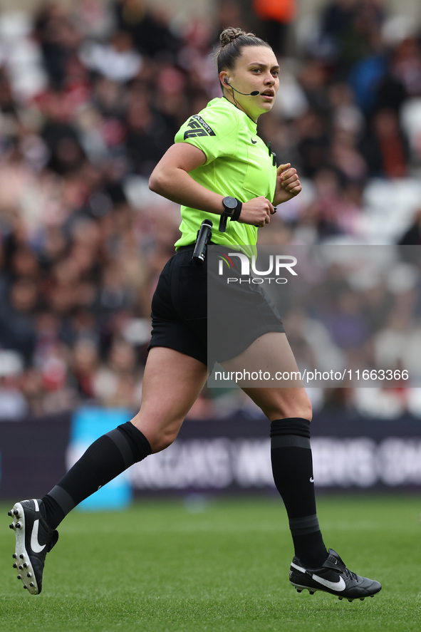 Match referee Phoebe Cross officiates during the FA Women's Championship match between Sunderland and Newcastle United at the Stadium Of Lig...