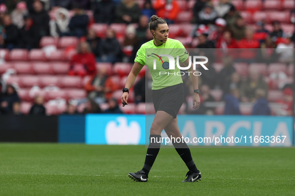 Match referee Phoebe Cross officiates during the FA Women's Championship match between Sunderland and Newcastle United at the Stadium Of Lig...