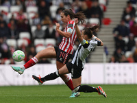 Natasha Fenton of Sunderland battles with Amber Keegan-Stobbs of Newcastle during the FA Women's Championship match between Sunderland and N...