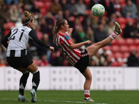 Emily Scarr of Sunderland competes with Jasmine McQuade of Newcastle during the FA Women's Championship match between Sunderland and Newcast...