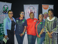 Social workers stand at their exhibition stand during the World Mental Health Day Awakening Summit, organized to discuss ''Mental Health at...