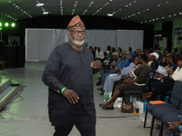 Toye Arologun, former Commissioner for Information, Oyo State and Founder of Suicide Is Not Solution (SINS), leaves the stage after his pres...