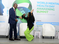 Eniola Bello, founder of Mindsplace and convener of the World Mental Health Day Awakening Summit, greets Femi Olubanwo, a lawyer and Chairma...