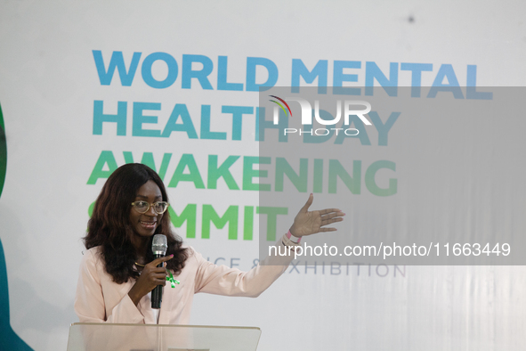 Dr. Jesupelumi Adenihun, author of ''Eat to Wealth'' and speaker, makes a presentation during the World Mental Health Day Awakening Summit,...