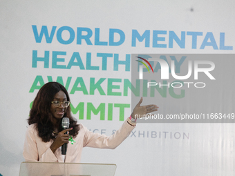 Dr. Jesupelumi Adenihun, author of ''Eat to Wealth'' and speaker, makes a presentation during the World Mental Health Day Awakening Summit,...