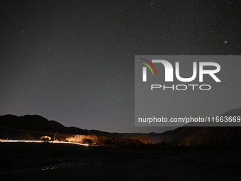 In Hejing, China, on October 13, 2024, Kerguti Scenic Area is under the starry sky. (