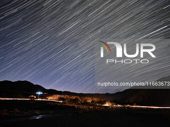 In Hejing, China, on October 13, 2024, Kerguti Scenic Area is under the starry sky. (