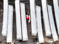 Villagers dry their noodles on wooden tanning racks in front and back of their farmhouses in Fuzhou, China, on October 13, 2024. (