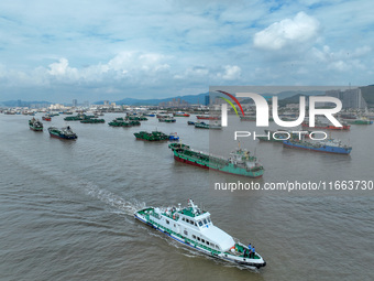 An anti-smuggling brigade carries out a maritime patrol and law enforcement operation in Zhoushan, China, on October 14, 2024. (