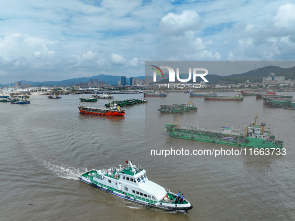 An anti-smuggling brigade carries out a maritime patrol and law enforcement operation in Zhoushan, China, on October 14, 2024. 