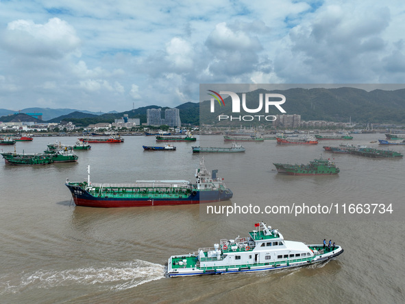 An anti-smuggling brigade carries out a maritime patrol and law enforcement operation in Zhoushan, China, on October 14, 2024. 