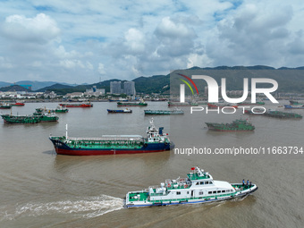 An anti-smuggling brigade carries out a maritime patrol and law enforcement operation in Zhoushan, China, on October 14, 2024. (