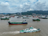 An anti-smuggling brigade carries out a maritime patrol and law enforcement operation in Zhoushan, China, on October 14, 2024. (