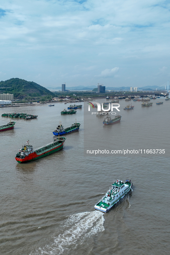 An anti-smuggling brigade carries out a maritime patrol and law enforcement operation in Zhoushan, China, on October 14, 2024. 