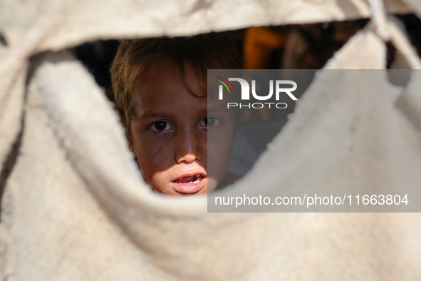 With The Approach Of Winter, Students In The Deir Ballut Camp In Rural Aleppo Study In A School Made Up Of Torn Tents, on october 13, 2024.