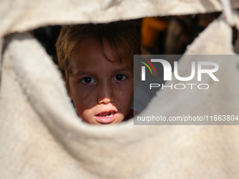 With The Approach Of Winter, Students In The Deir Ballut Camp In Rural Aleppo Study In A School Made Up Of Torn Tents, on october 13, 2024.(