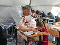 With The Approach Of Winter, Students In The Deir Ballut Camp In Rural Aleppo Study In A School Made Up Of Torn Tents, on october 13, 2024.(