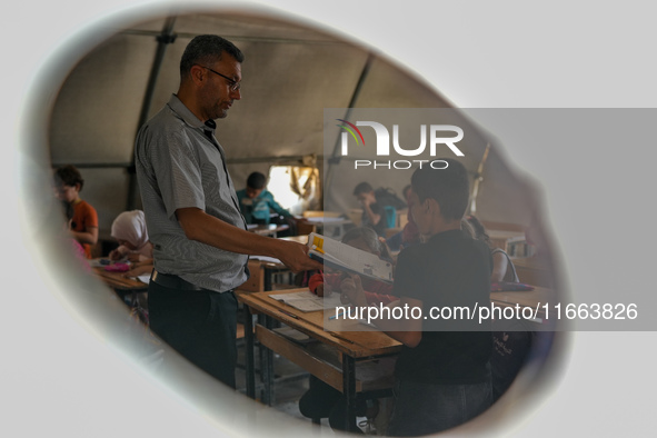 With The Approach Of Winter, Students In The Deir Ballut Camp In Rural Aleppo Study In A School Made Up Of Torn Tents, on october 13, 2024.