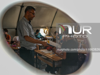 With The Approach Of Winter, Students In The Deir Ballut Camp In Rural Aleppo Study In A School Made Up Of Torn Tents, on october 13, 2024.(