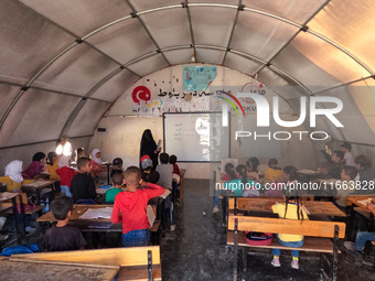 With The Approach Of Winter, Students In The Deir Ballut Camp In Rural Aleppo Study In A School Made Up Of Torn Tents, on october 13, 2024.(