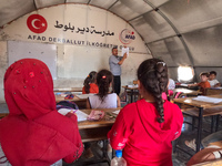 With The Approach Of Winter, Students In The Deir Ballut Camp In Rural Aleppo Study In A School Made Up Of Torn Tents, on october 13, 2024.(