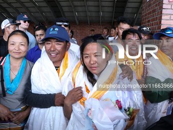 Dawa Yangzum Sherpa, the first Nepalese woman to summit all 14 of the world's highest 8000m peaks, arrives at Tribhuvan International Airpor...