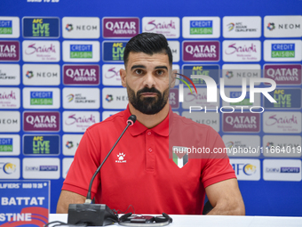 Palestine national team player Musab Battat attends a press conference at Jassim Bin Hamad Stadium in Doha, Qatar, on October 14, 2024, ahea...